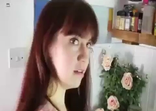 Redhead with bangs sucks dad's cock in the kitchen