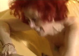 Pudgy redhead MILF sucks her son's cock